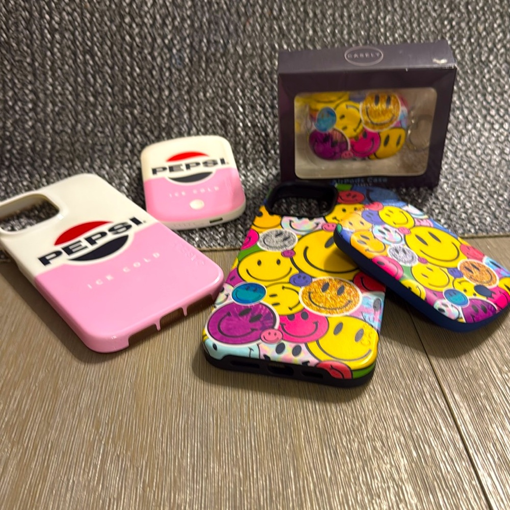 iPhone 13 Pro Max Casely cases with matching iPod case for smiley face set.